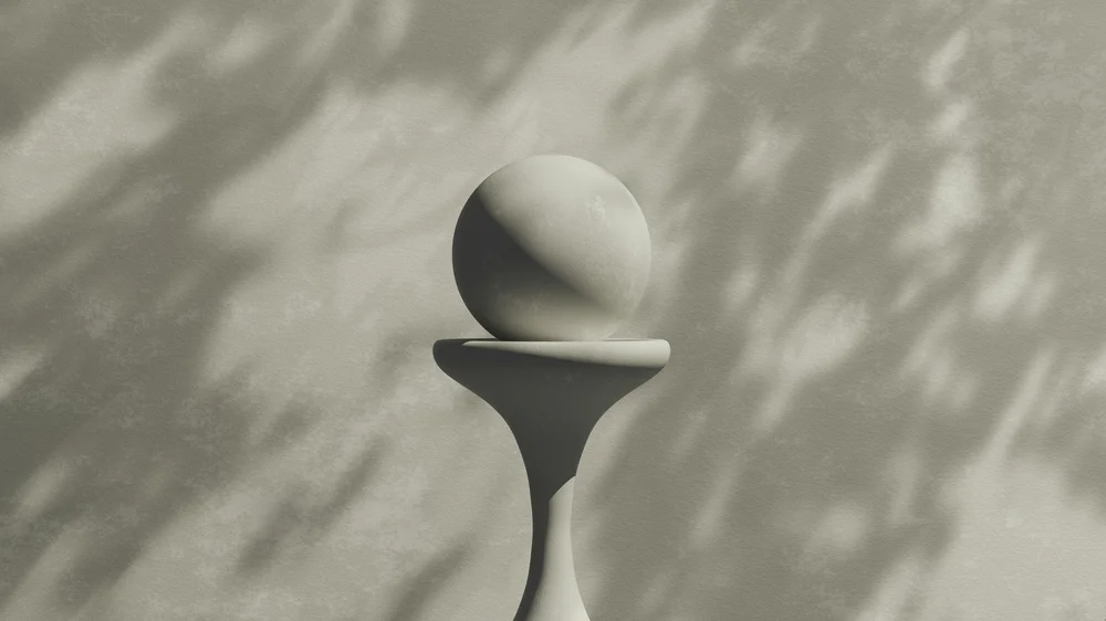 Sculptural sphere balanced in soft natural light, representing growth and potential